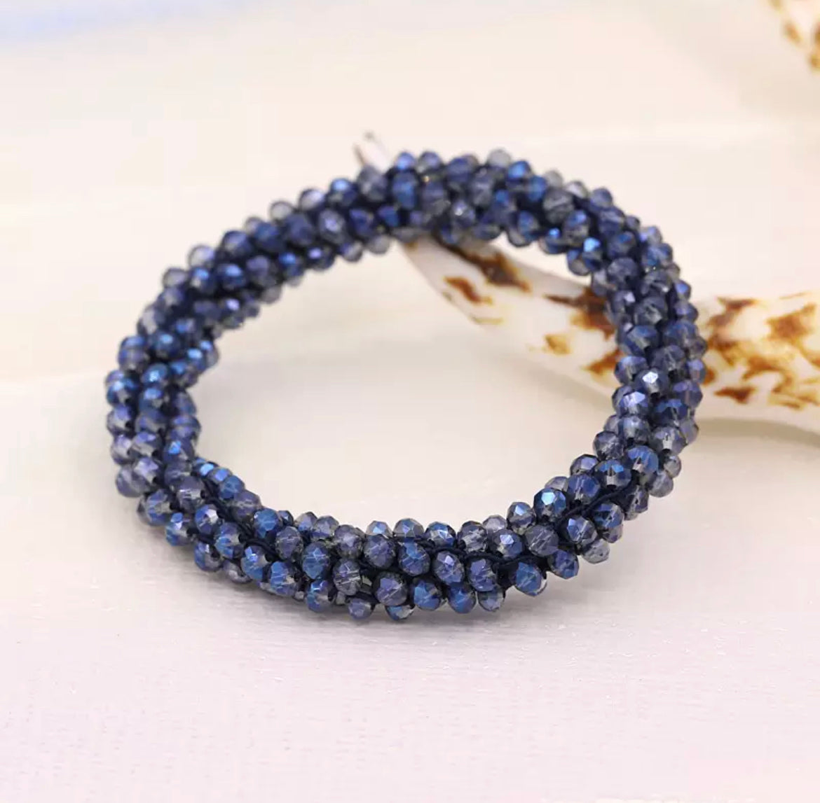 Aurina Ltd chunky beaded gem bracelet in dark blue, side view