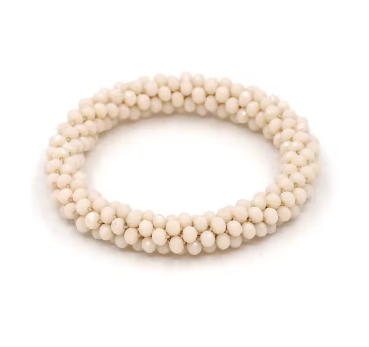 Aurina Ltd chunky beaded gem bracelet in light beige color, side view