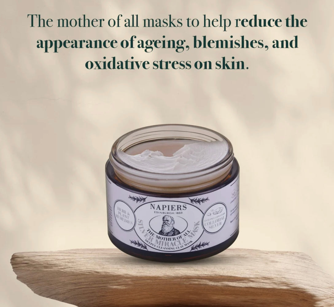 Aurina Pop UP Ltd Napiers Mother of All Silver Miracle Face Mask in silver jar, displayed on wood