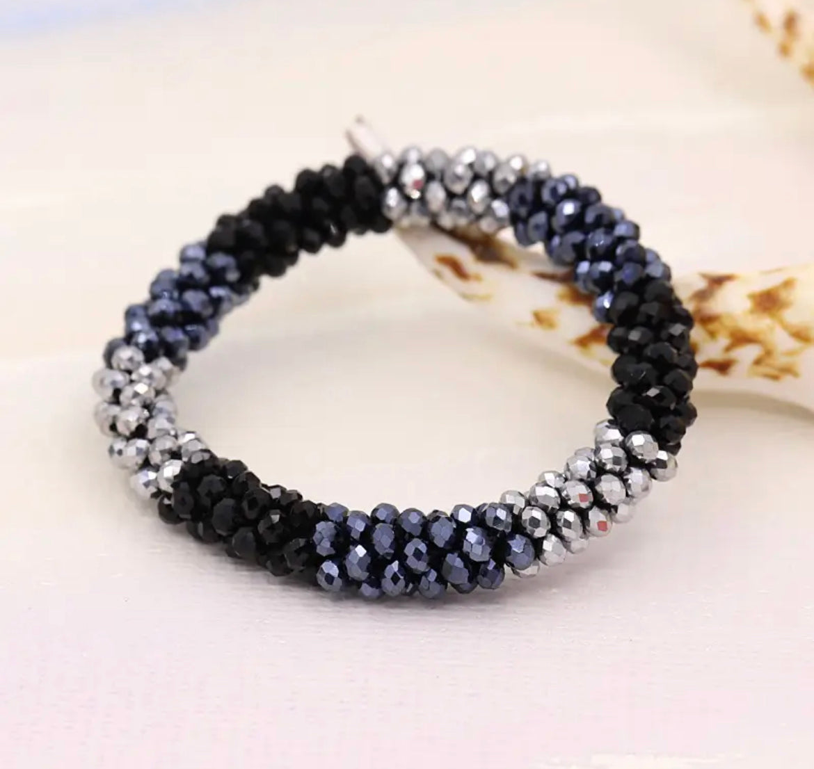 Aurina Ltd chunky beaded gem bracelet in black and silver, side view