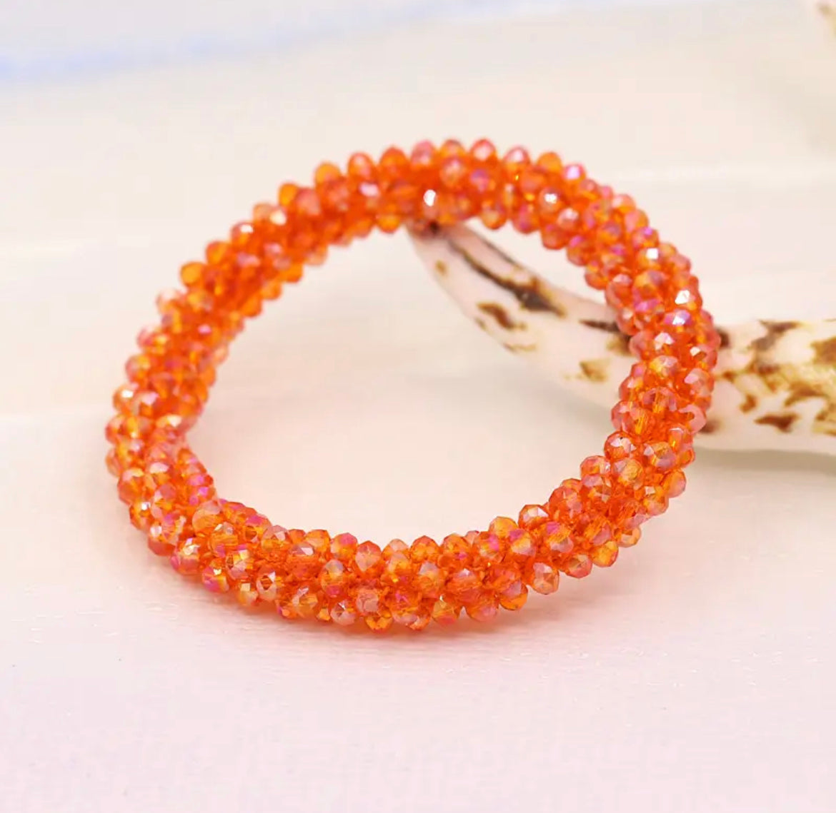 Aurina Ltd chunky beaded gem bracelet in orange, side view