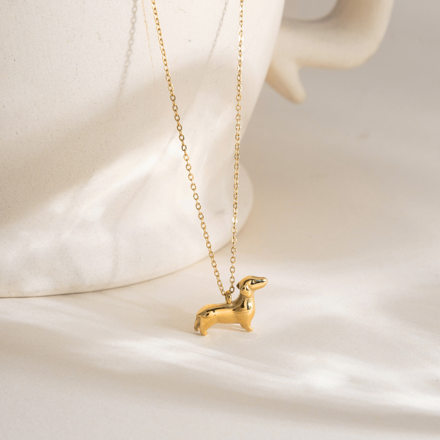 Sausage dog necklace in gold