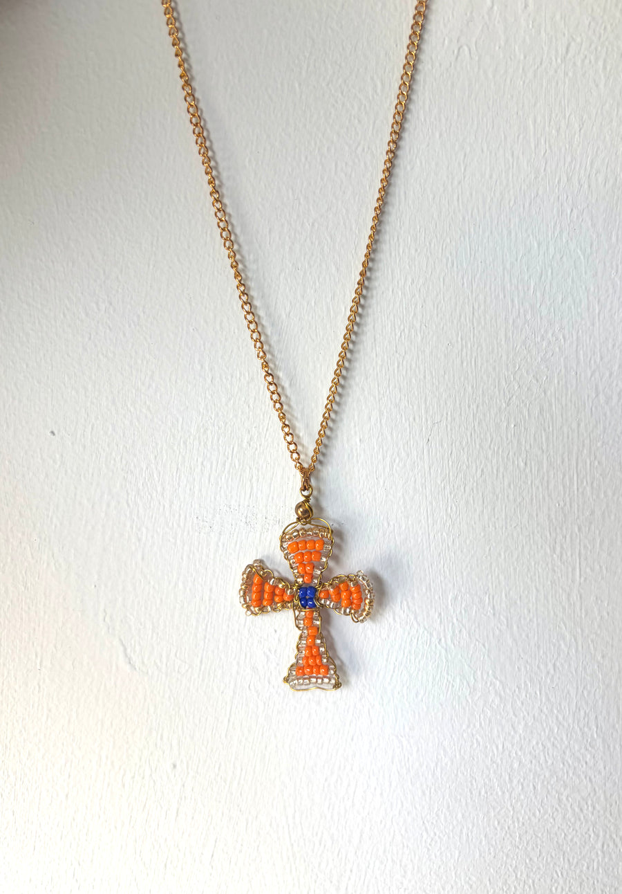 Hand beaded orange and cobalt cross necklace
