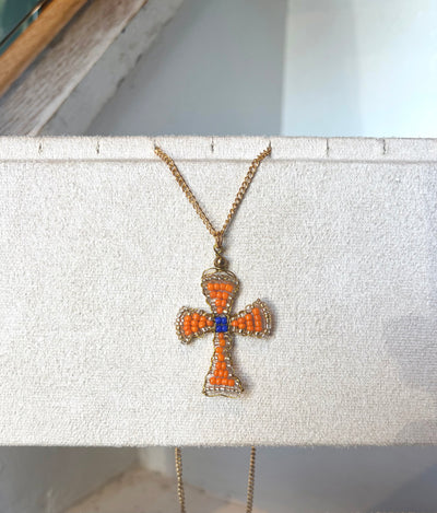 Hand beaded orange and cobalt cross necklace
