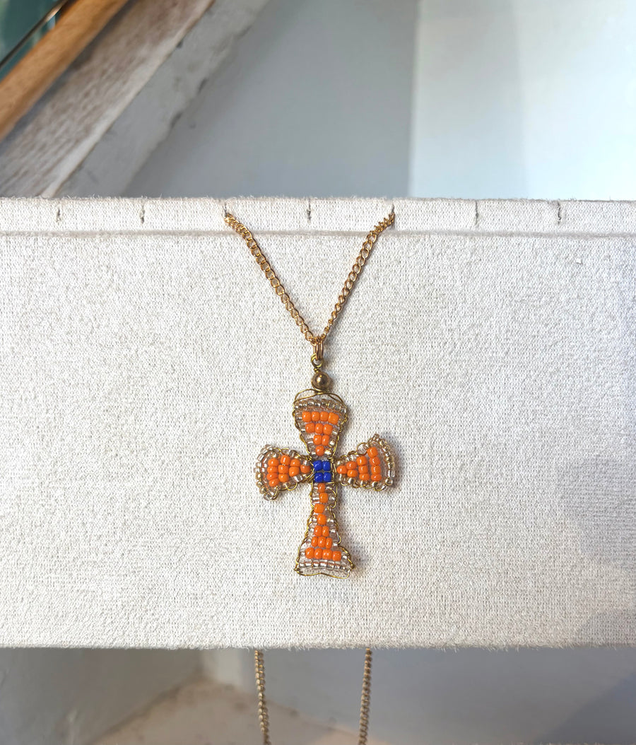 Hand beaded orange and cobalt cross necklace