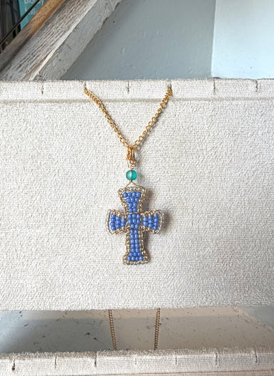 Hand beaded periwinkle cross necklace