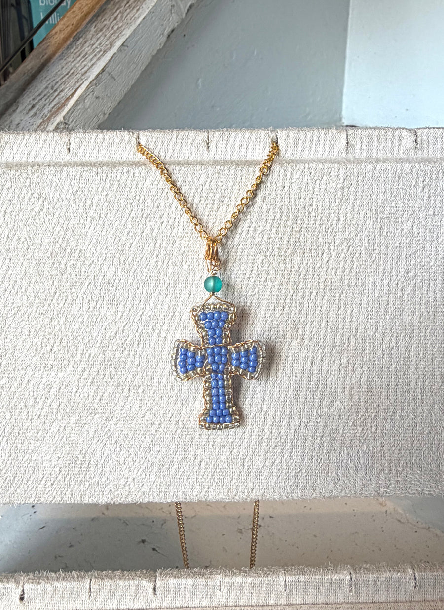 Hand beaded periwinkle cross necklace