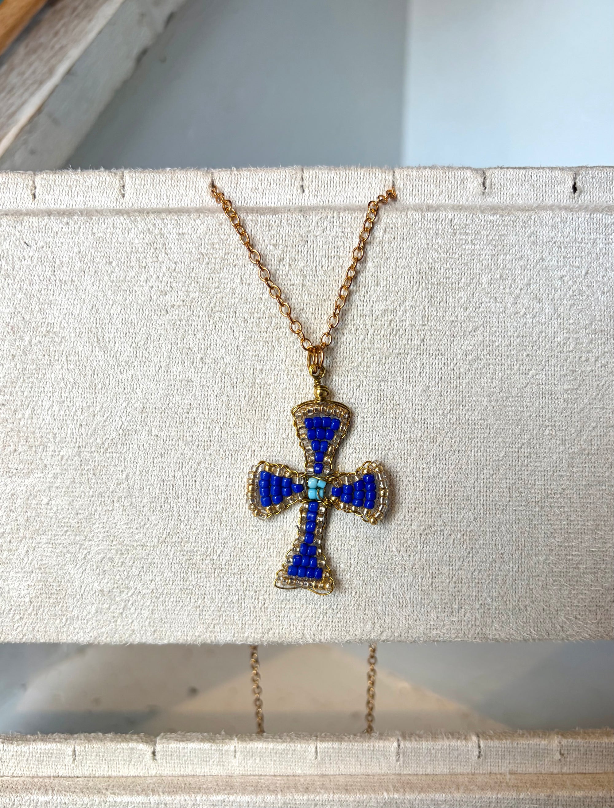 Hand beaded royal and baby blue cross necklace