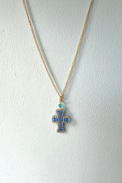 Hand beaded periwinkle cross necklace