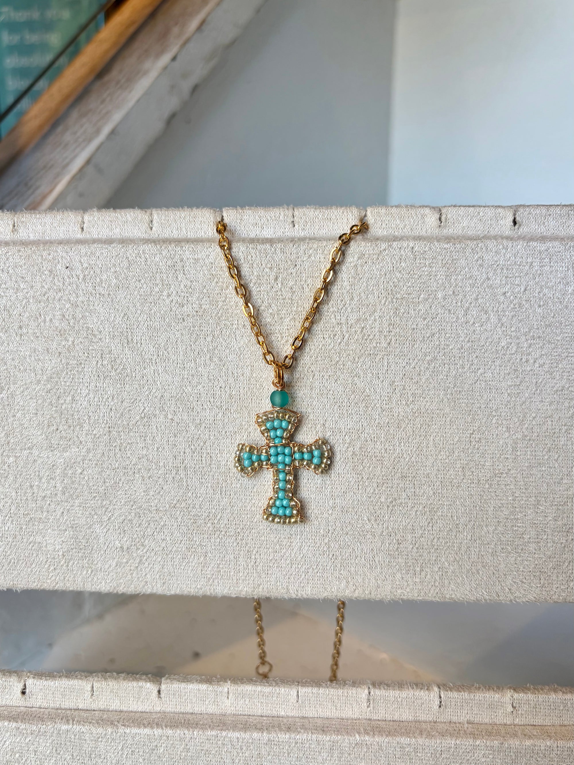 Hand beaded turquoise cross necklace