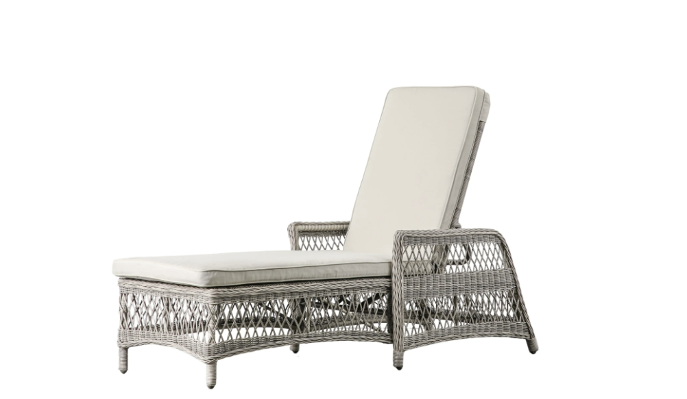 Aurina Menton Sun Lounger in gray wicker with cream cushion, side profile view