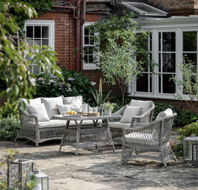 Aurina Menton Garden Sofa Set gray wicker sofa set in garden setting, lifestyle view