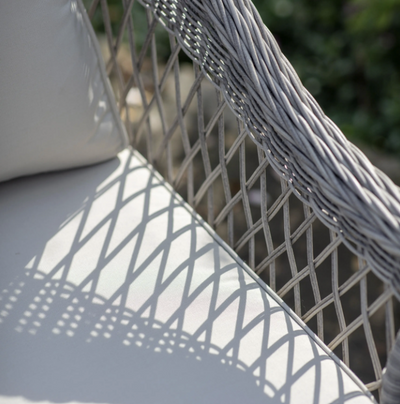 Aurina Menton Garden Sofa Set close-up of gray wicker detail and cream cushion
